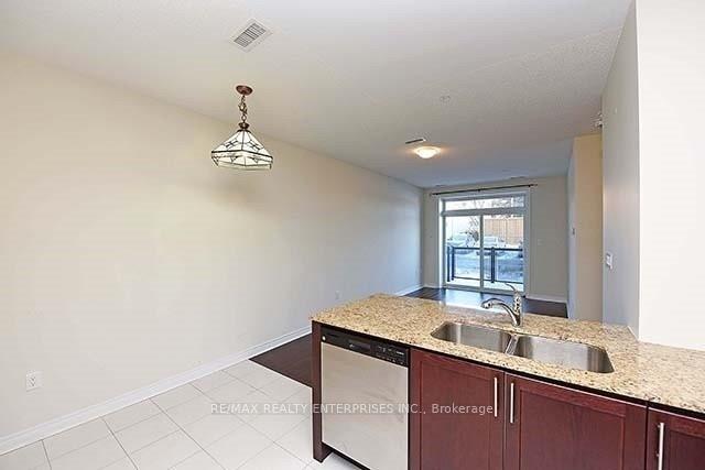 Photo 5 of Unit 105, 7768 Kennedy Road, Markham, Milliken Mills West — HOMEH