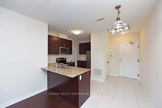 Photo 4 of Unit 105, 7768 Kennedy Road, Markham, Milliken Mills West — HOMEH