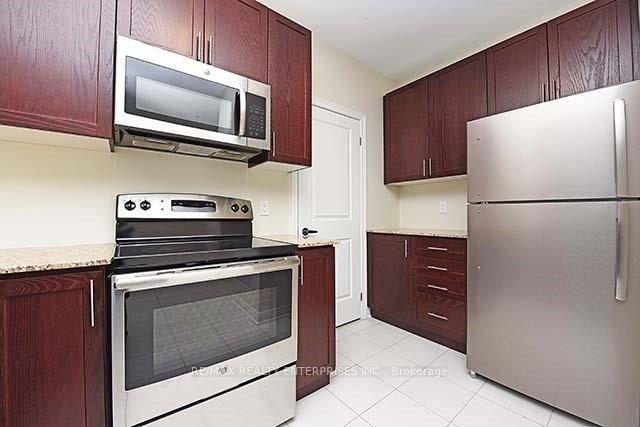 Photo 9 of Unit 105, 7768 Kennedy Road, Markham, Milliken Mills West — HOMEH