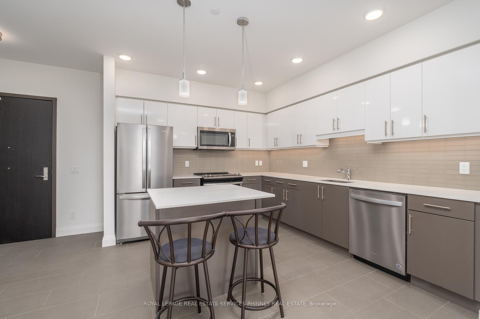 Photo 16 of Unit 404, 399 Queen Street S, Kitchener — HOMEH