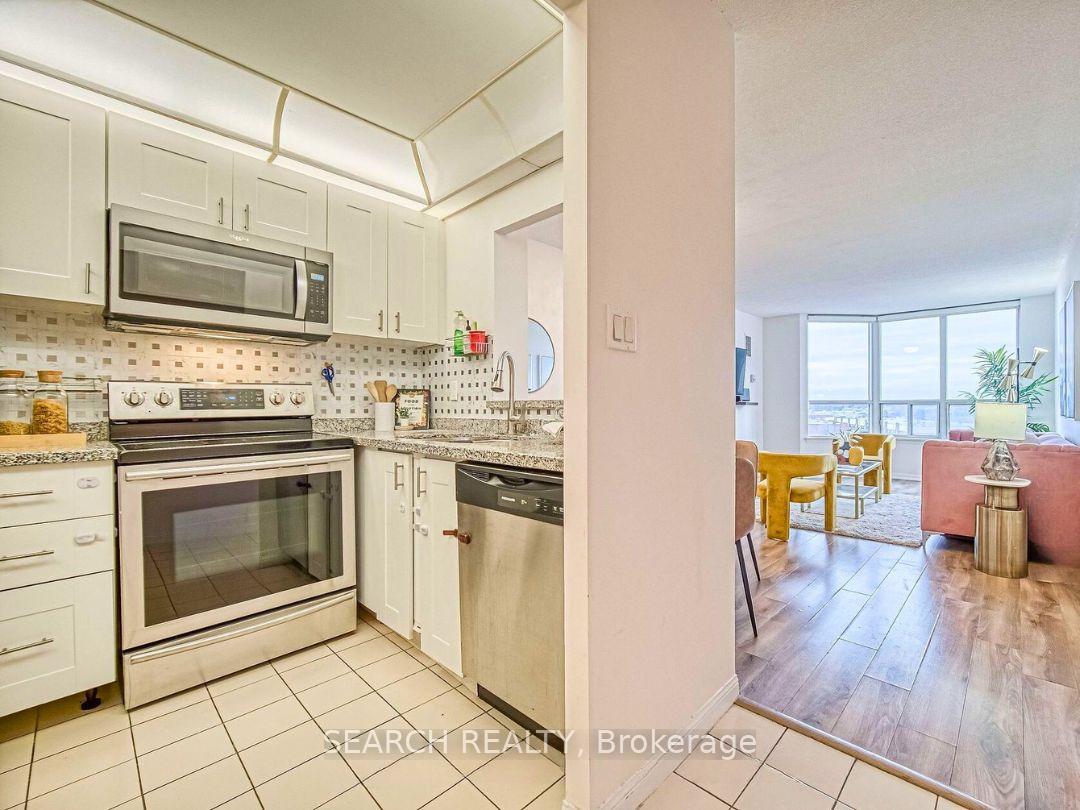 Photo 3 of Unit 305, 88 Corporate Drive, Scarborough, Woburn — HOMEH