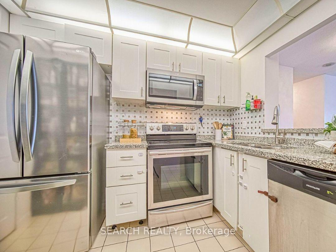 Photo 6 of Unit 305, 88 Corporate Drive, Scarborough, Woburn — HOMEH