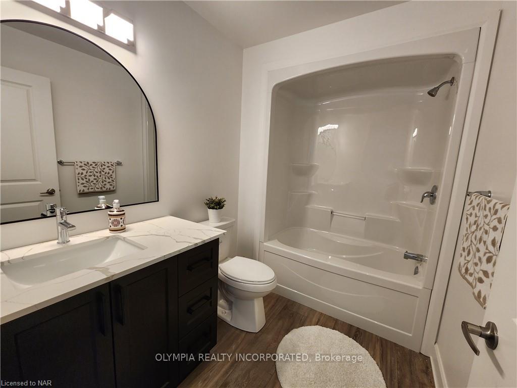 Photo 18 of Unit B407, 5629 Swayze Drive, Niagara Falls, Church's Lane — HOMEH