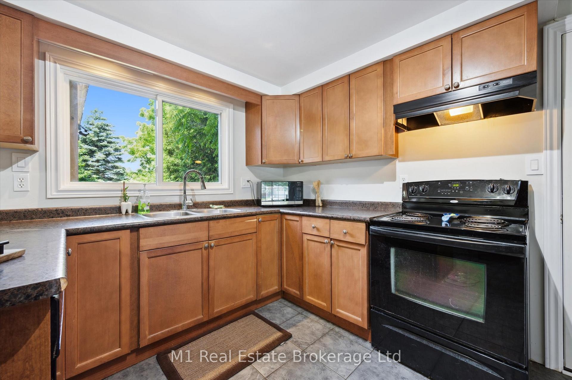 Photo 10 of 595 Willow Road, Guelph, Willow West/Sugarbush/West Acres — HOMEH