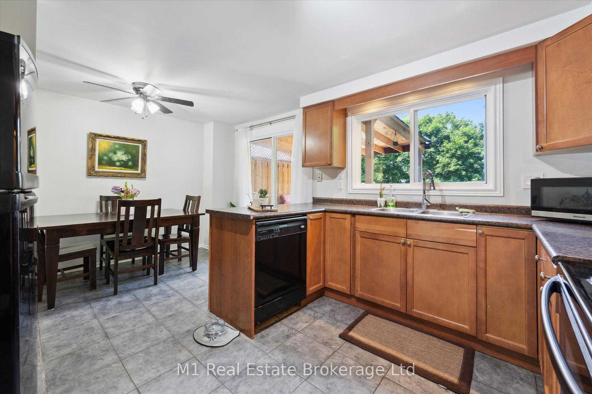 Photo 11 of 595 Willow Road, Guelph, Willow West/Sugarbush/West Acres — HOMEH