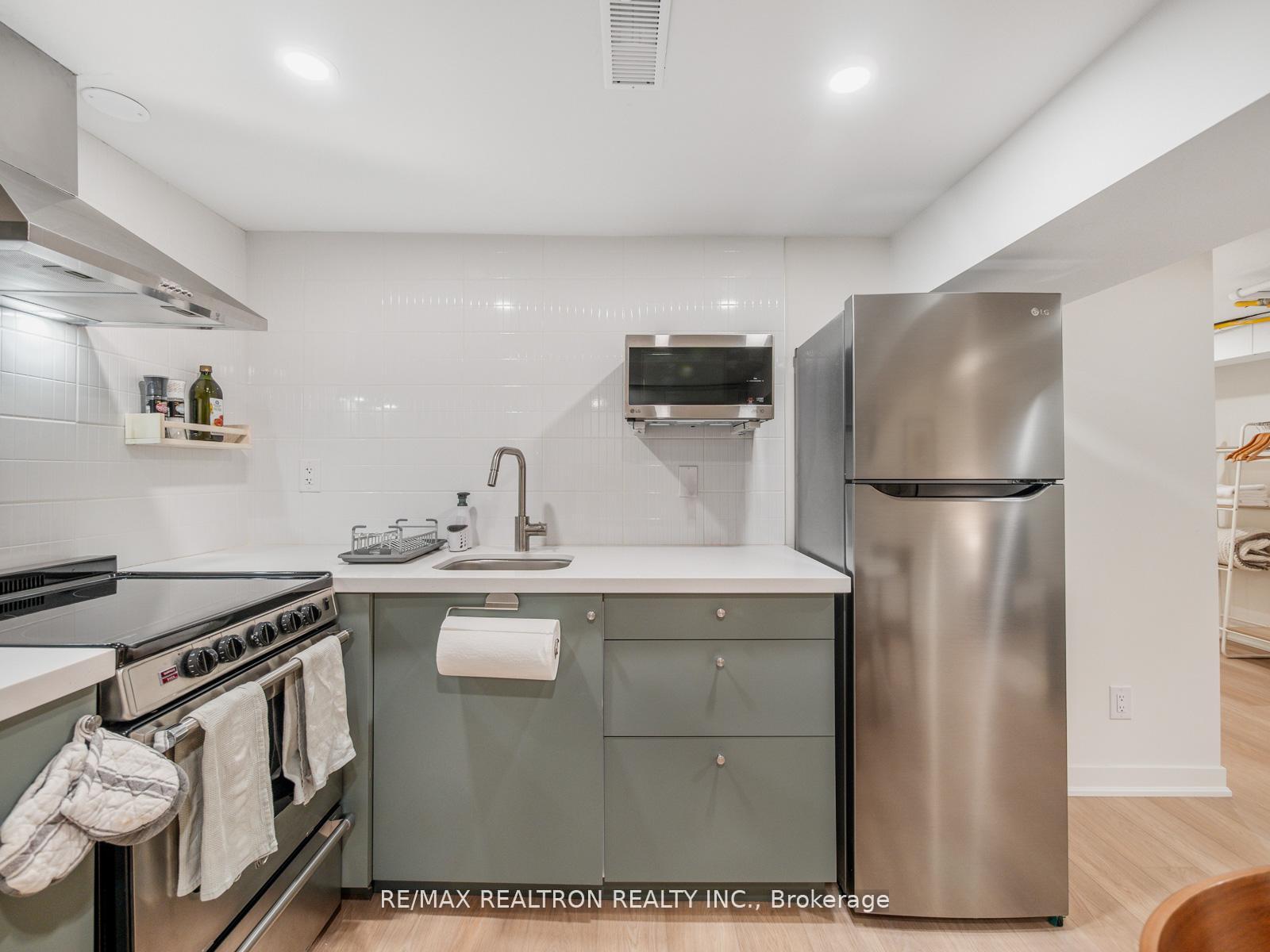Photo 30 of 400 Strathmore Boulevard, Toronto, Danforth — HOMEH