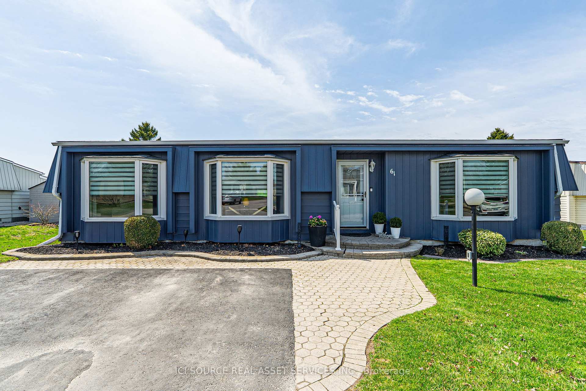 Front of 61 The Cove Road