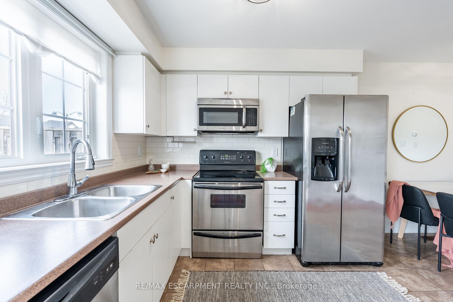 Photo 12 of Unit 48, 222 Fall Fair Way, Hamilton, Binbrook — HOMEH