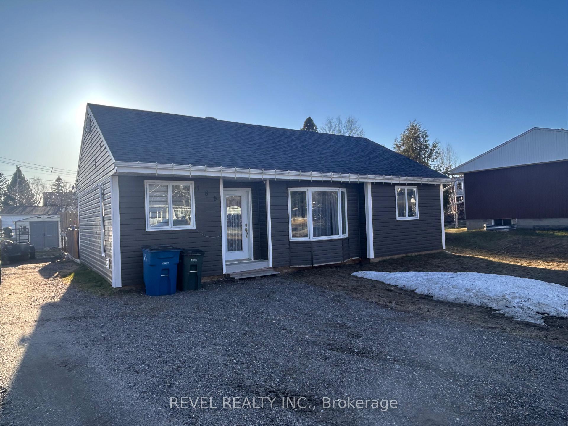 Photo 1 of 185 Fifteenth Avenue, Cochrane — HOMEH