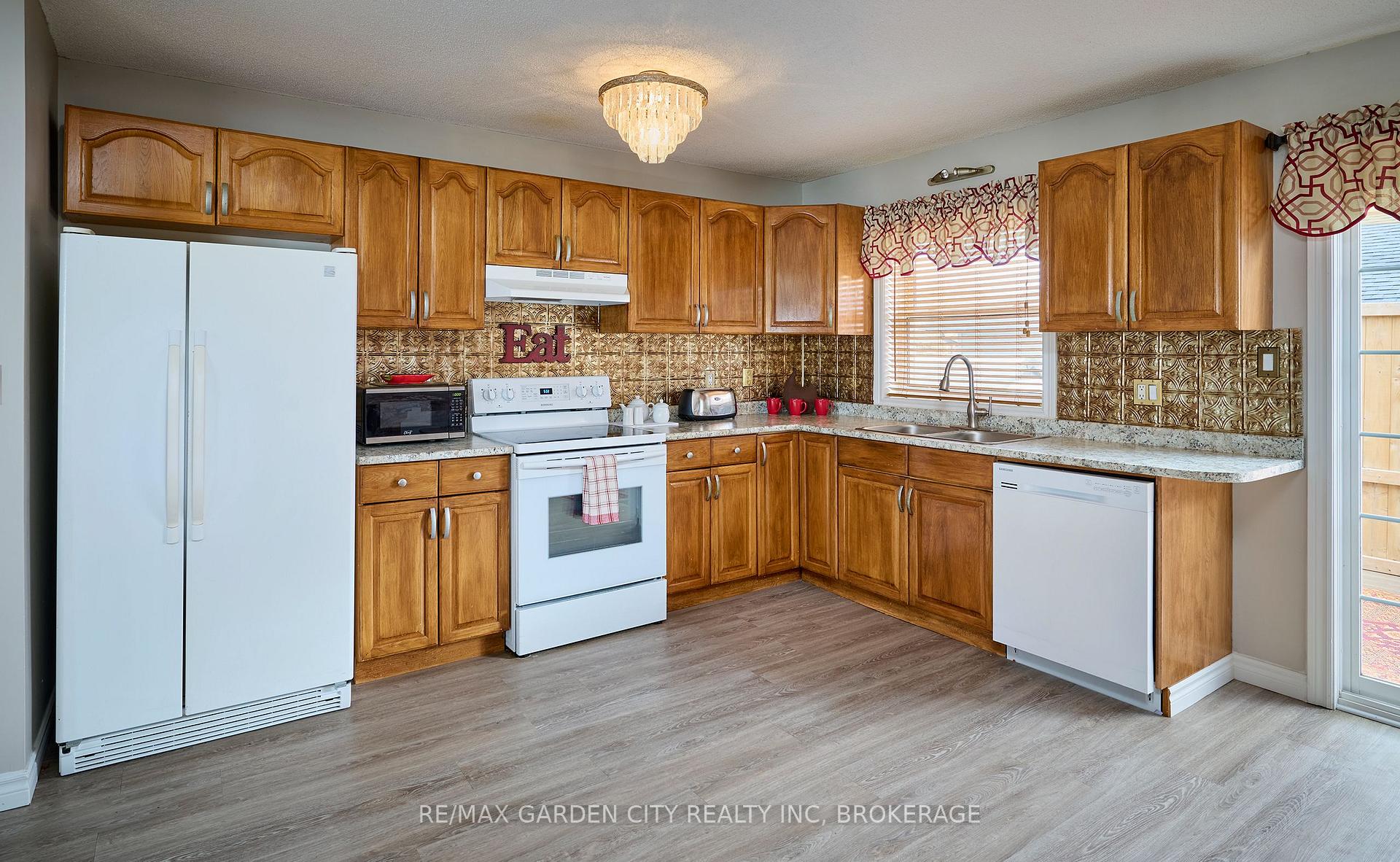 Photo 9 of 55 Apollo Drive, Port Colborne, Main Street — HOMEH