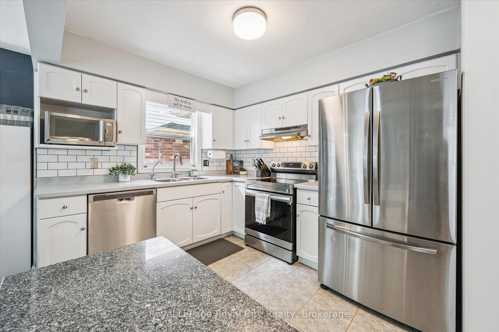 Photo 10 of 23 Fuller Drive, Guelph, Grange Road — HOMEH