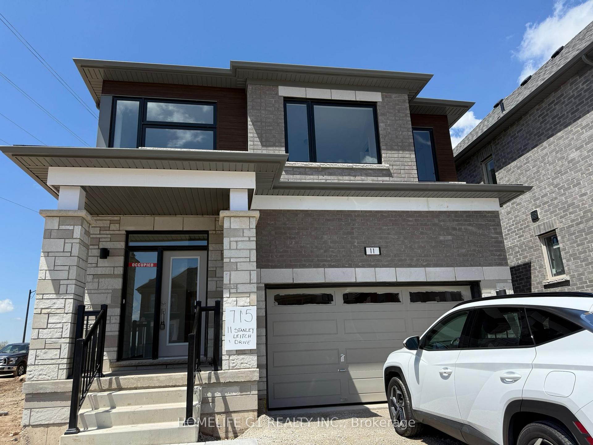 Photo 2 of 11 Stanley Leitch Drive, Cochrane, Erin — HOMEH