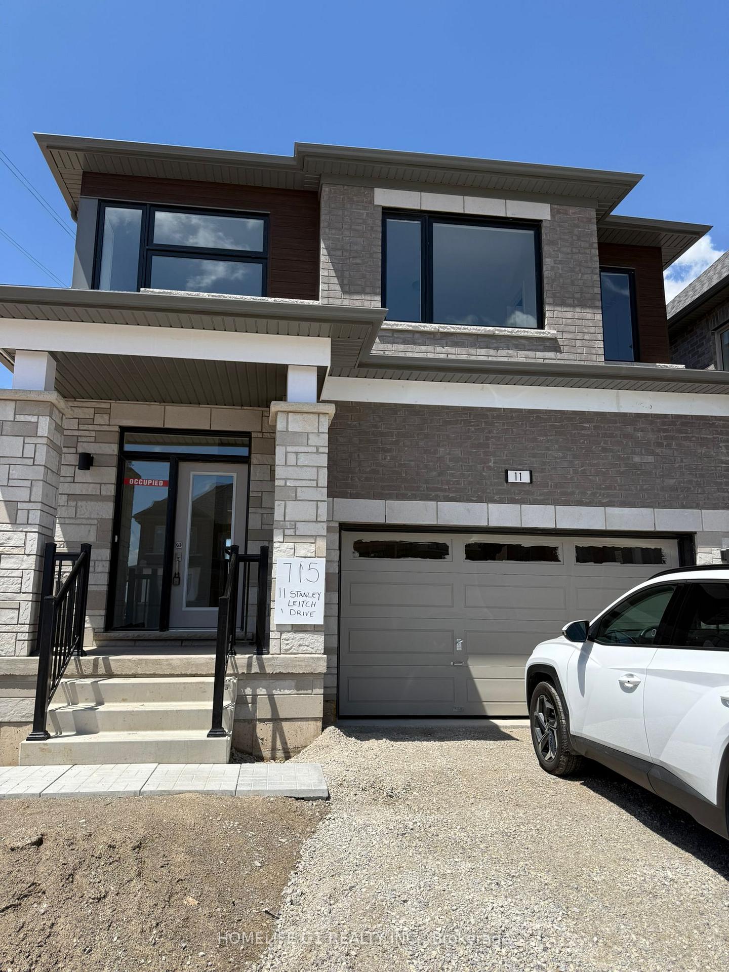 Photo 3 of 11 Stanley Leitch Drive, Cochrane, Erin — HOMEH