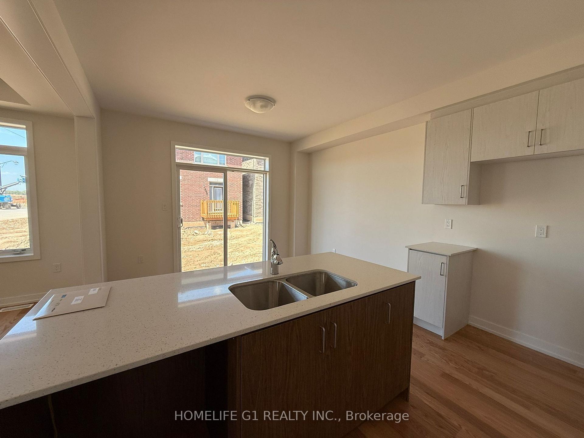 Photo 26 of 11 Stanley Leitch Drive, Cochrane, Erin — HOMEH