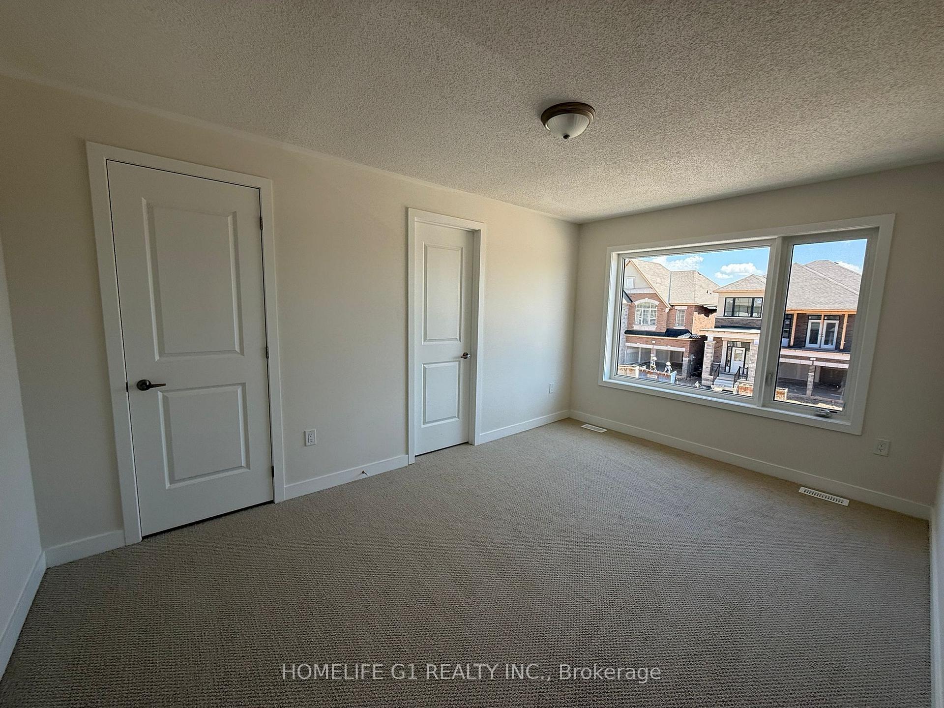 Photo 24 of 11 Stanley Leitch Drive, Cochrane, Erin — HOMEH