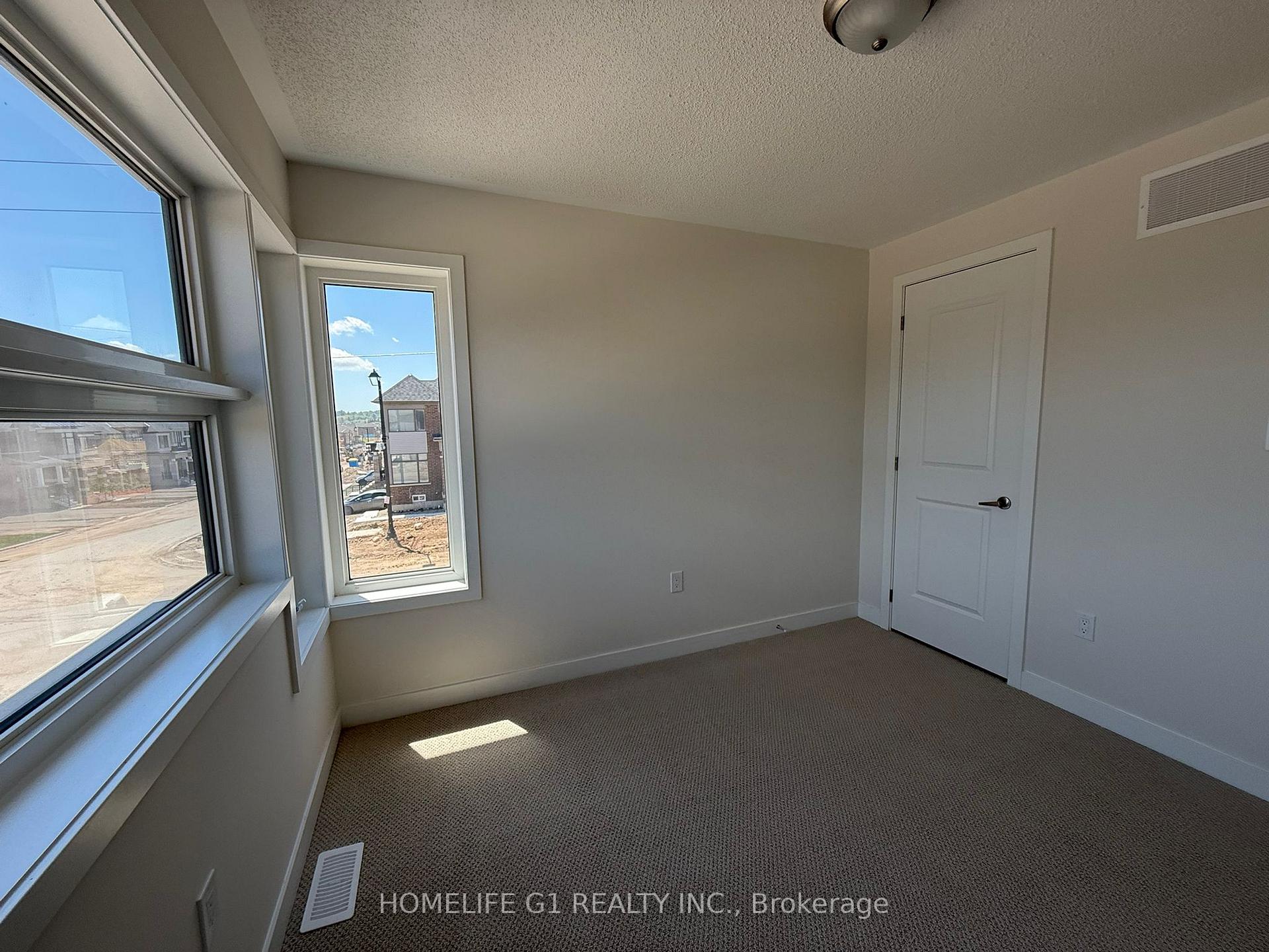 Photo 27 of 11 Stanley Leitch Drive, Cochrane, Erin — HOMEH