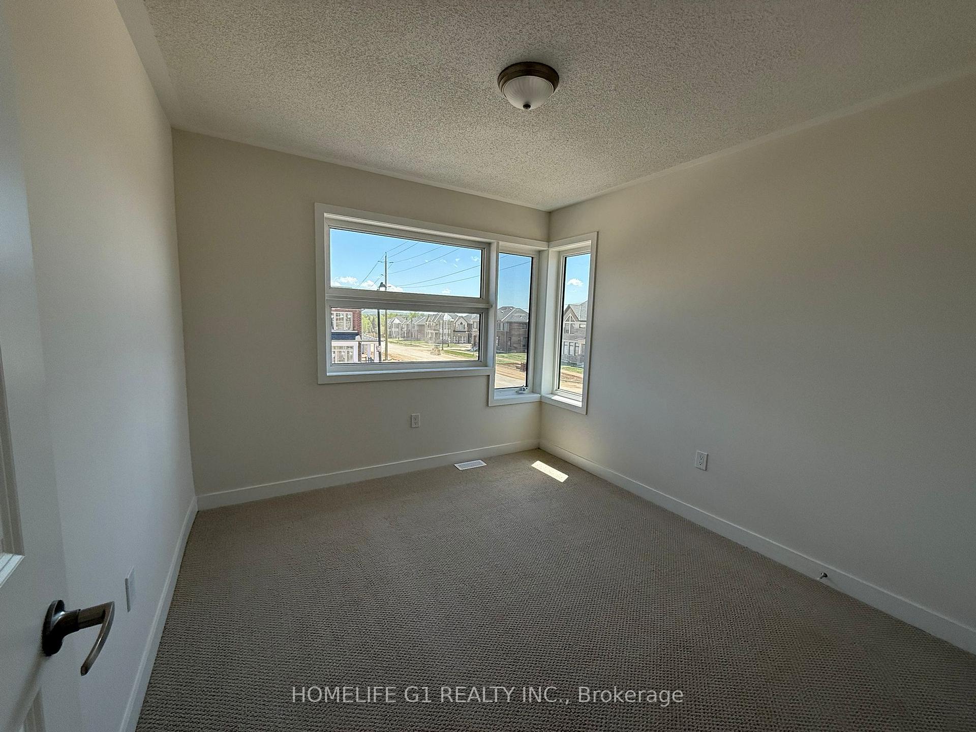 Photo 20 of 11 Stanley Leitch Drive, Cochrane, Erin — HOMEH