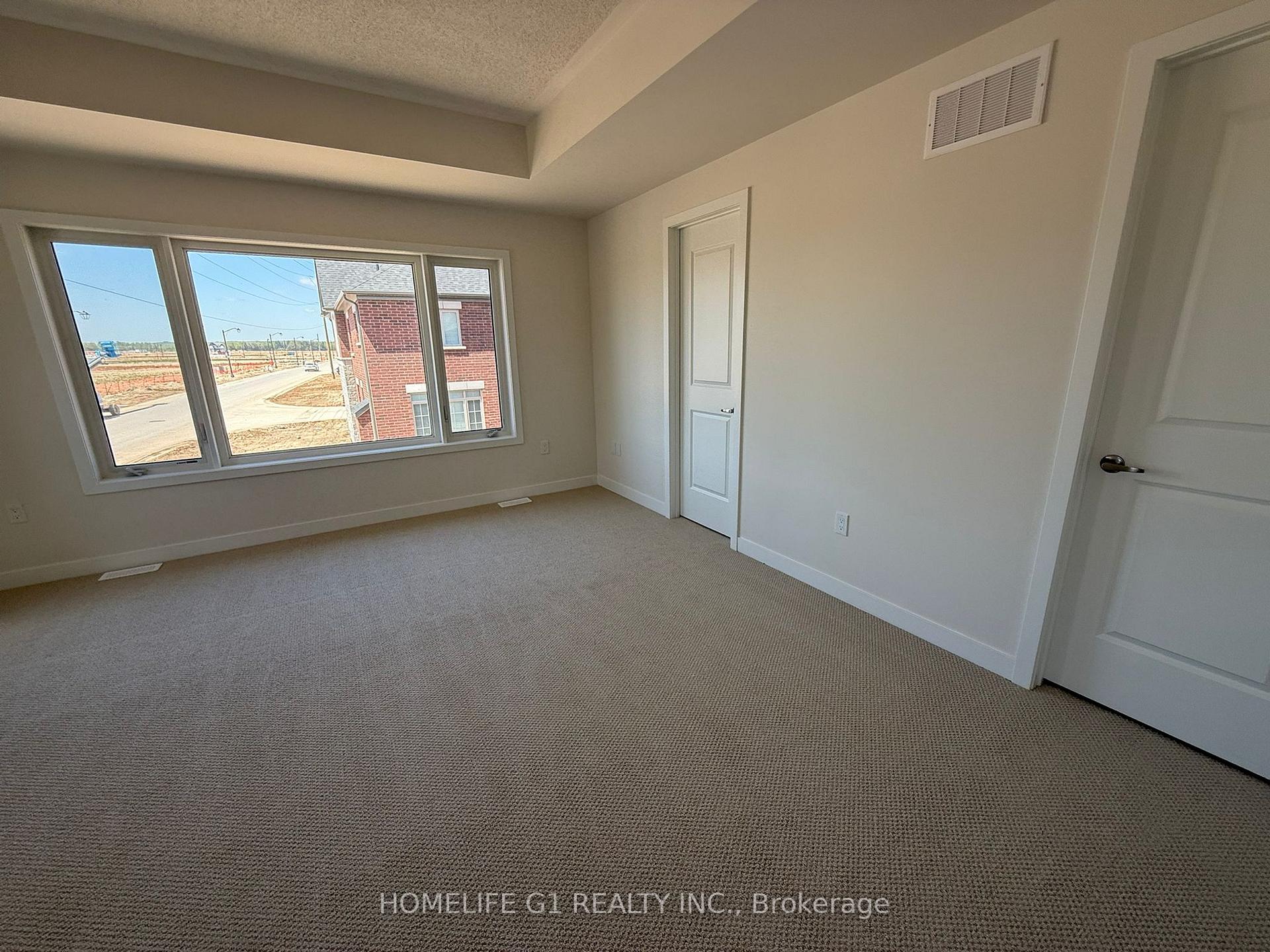 Photo 12 of 11 Stanley Leitch Drive, Cochrane, Erin — HOMEH