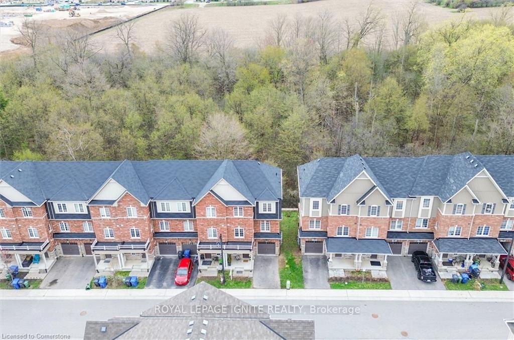 Photo 7 of Unit 51, 88 Decorso Drive, Guelph, Kortright East — HOMEH