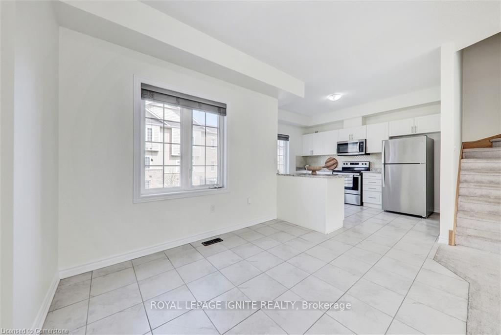 Photo 24 of Unit 51, 88 Decorso Drive, Guelph, Kortright East — HOMEH