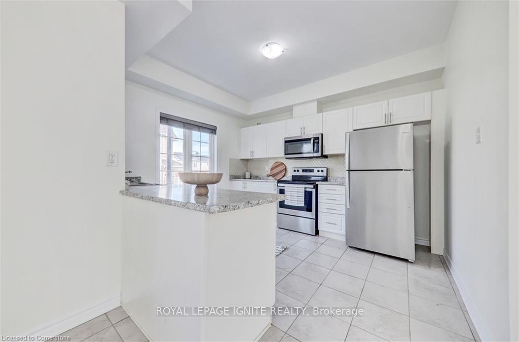 Photo 25 of Unit 51, 88 Decorso Drive, Guelph, Kortright East — HOMEH