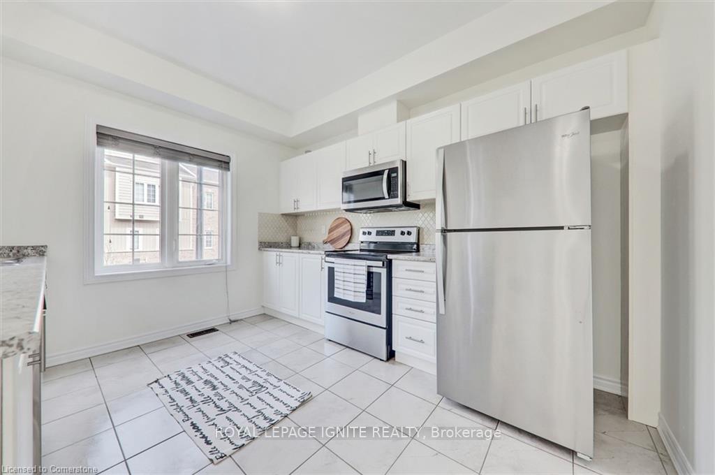 Photo 26 of Unit 51, 88 Decorso Drive, Guelph, Kortright East — HOMEH
