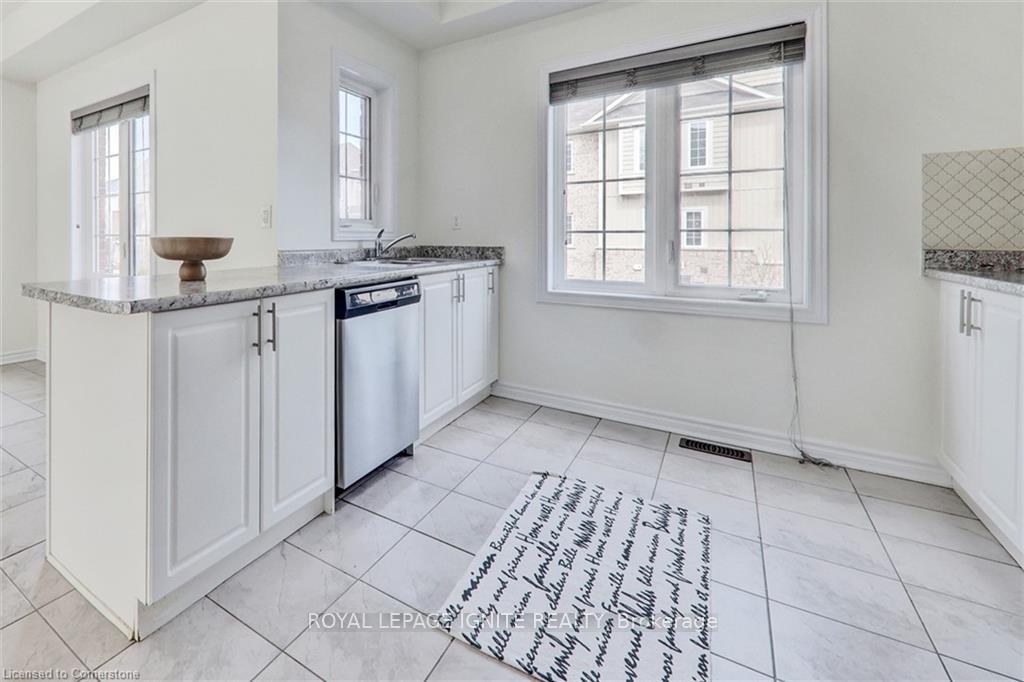Photo 27 of Unit 51, 88 Decorso Drive, Guelph, Kortright East — HOMEH