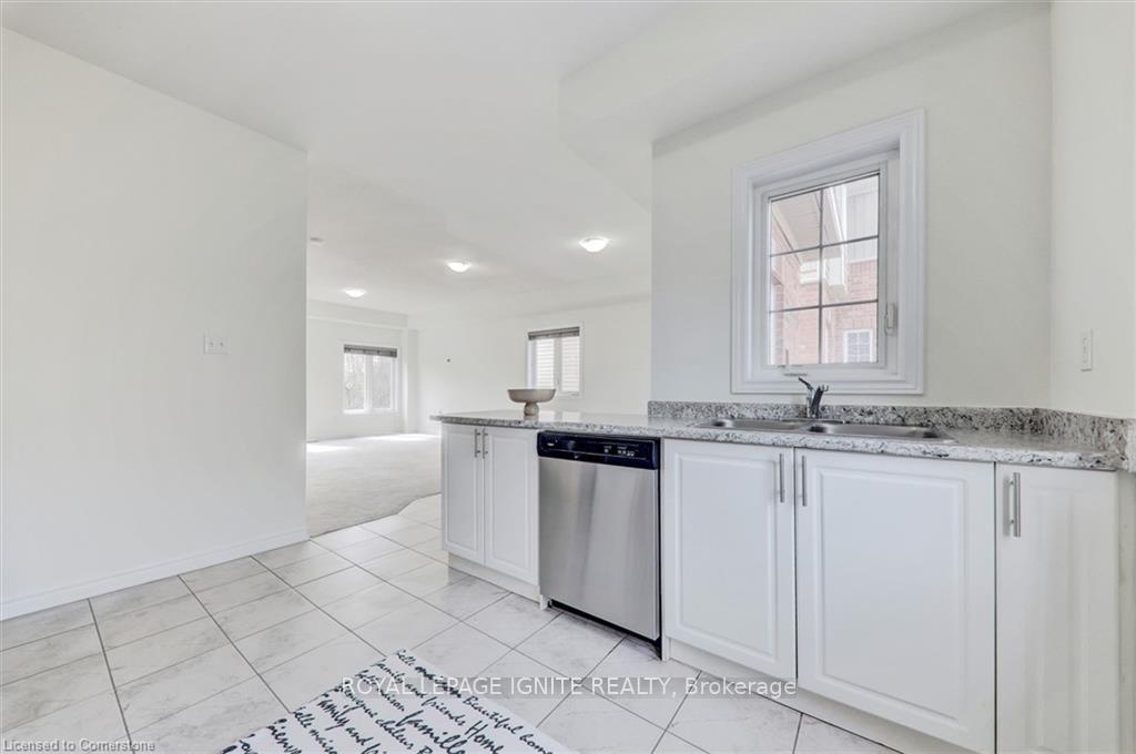 Photo 28 of Unit 51, 88 Decorso Drive, Guelph, Kortright East — HOMEH