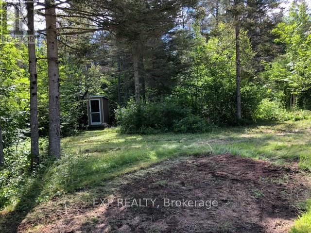 Photo 8 of 730 Dean Lake Road, Huron Shores — HOMEH