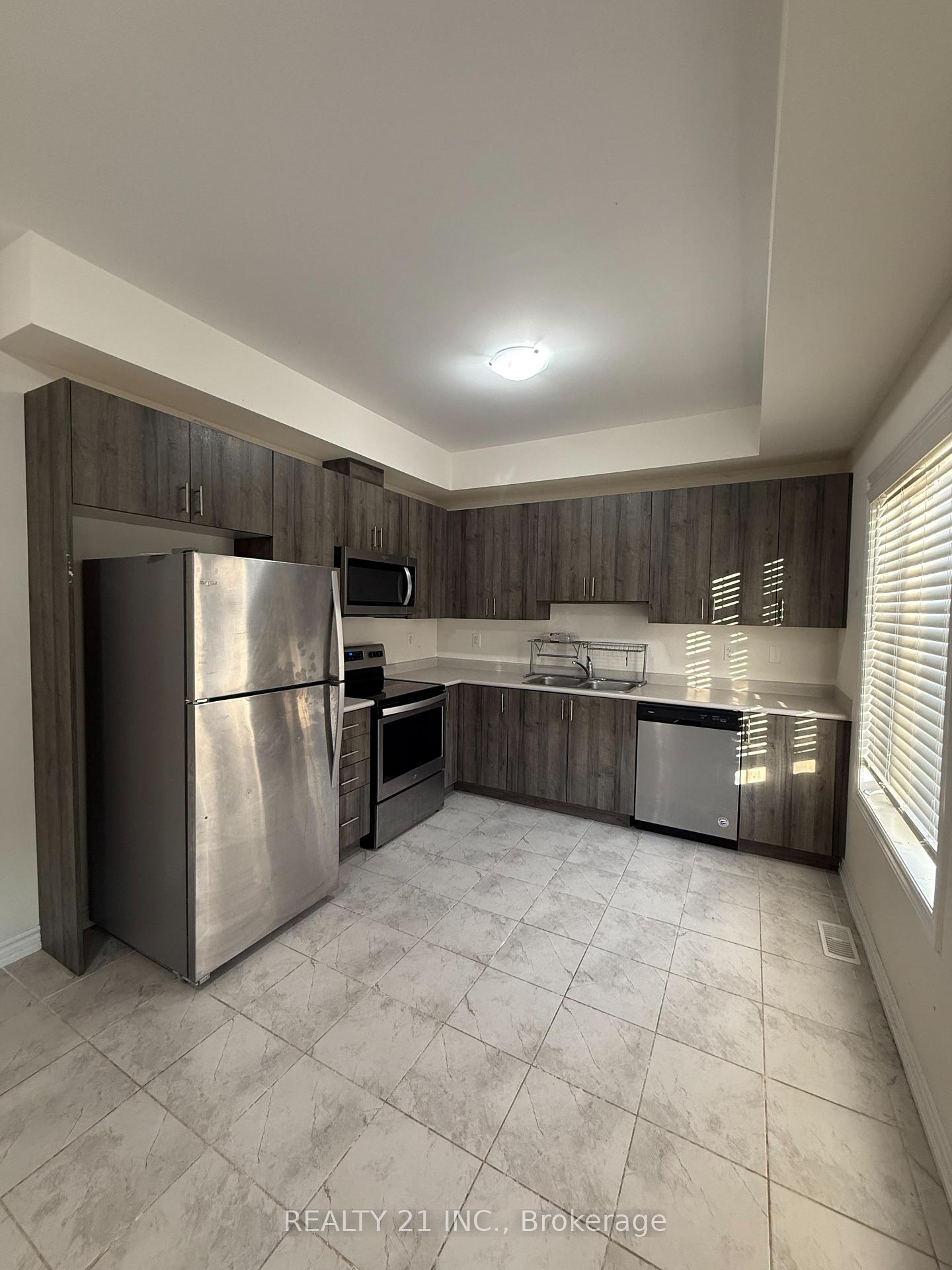 Photo 9 of Unit 42, 88 Decorso Drive, Guelph, Village By The Arboretum — HOMEH