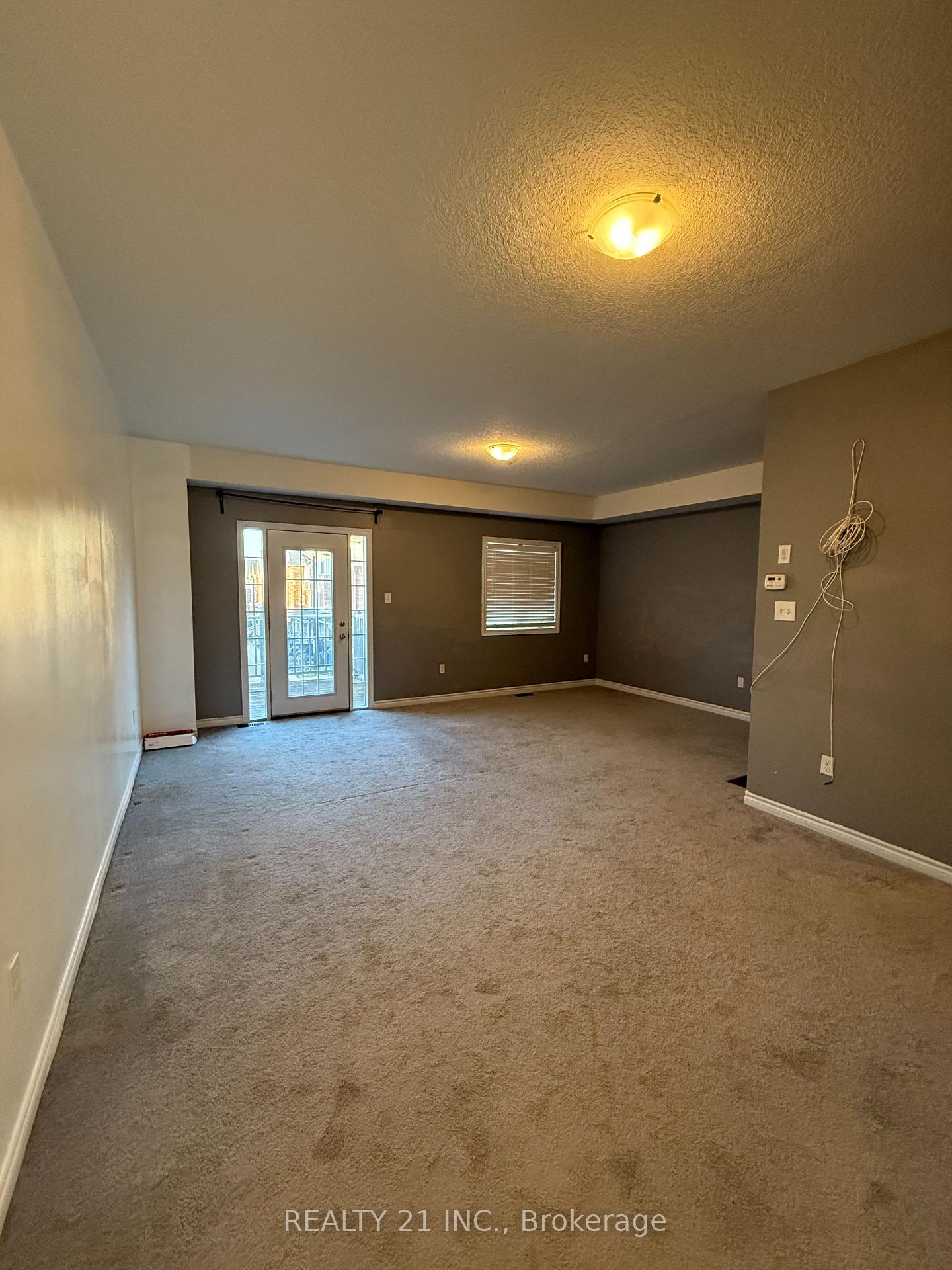 Photo 10 of Unit 42, 88 Decorso Drive, Guelph, Village By The Arboretum — HOMEH