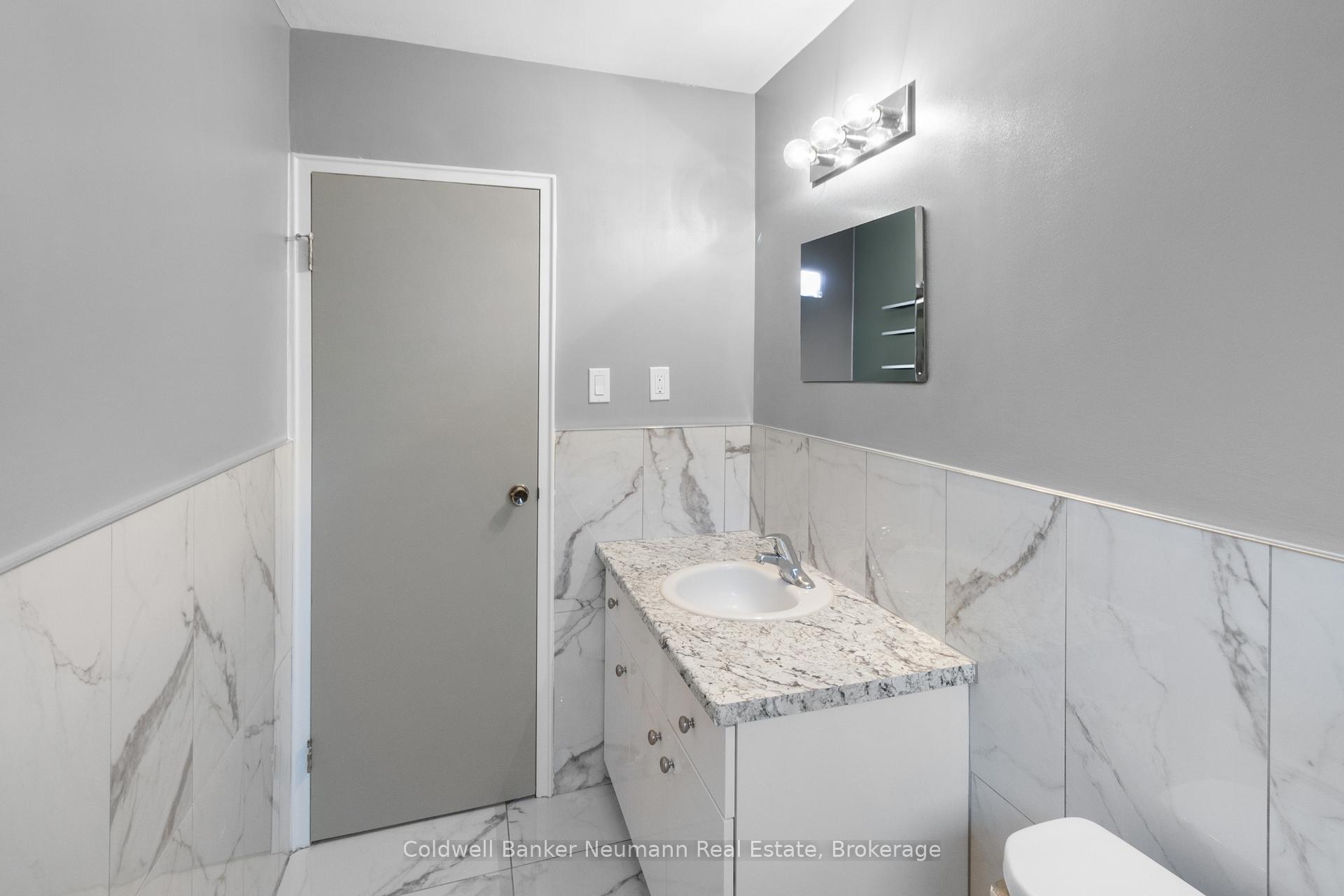 Photo 2 of Unit 1, 8 Delaware Avenue, Guelph, Victoria North — HOMEH