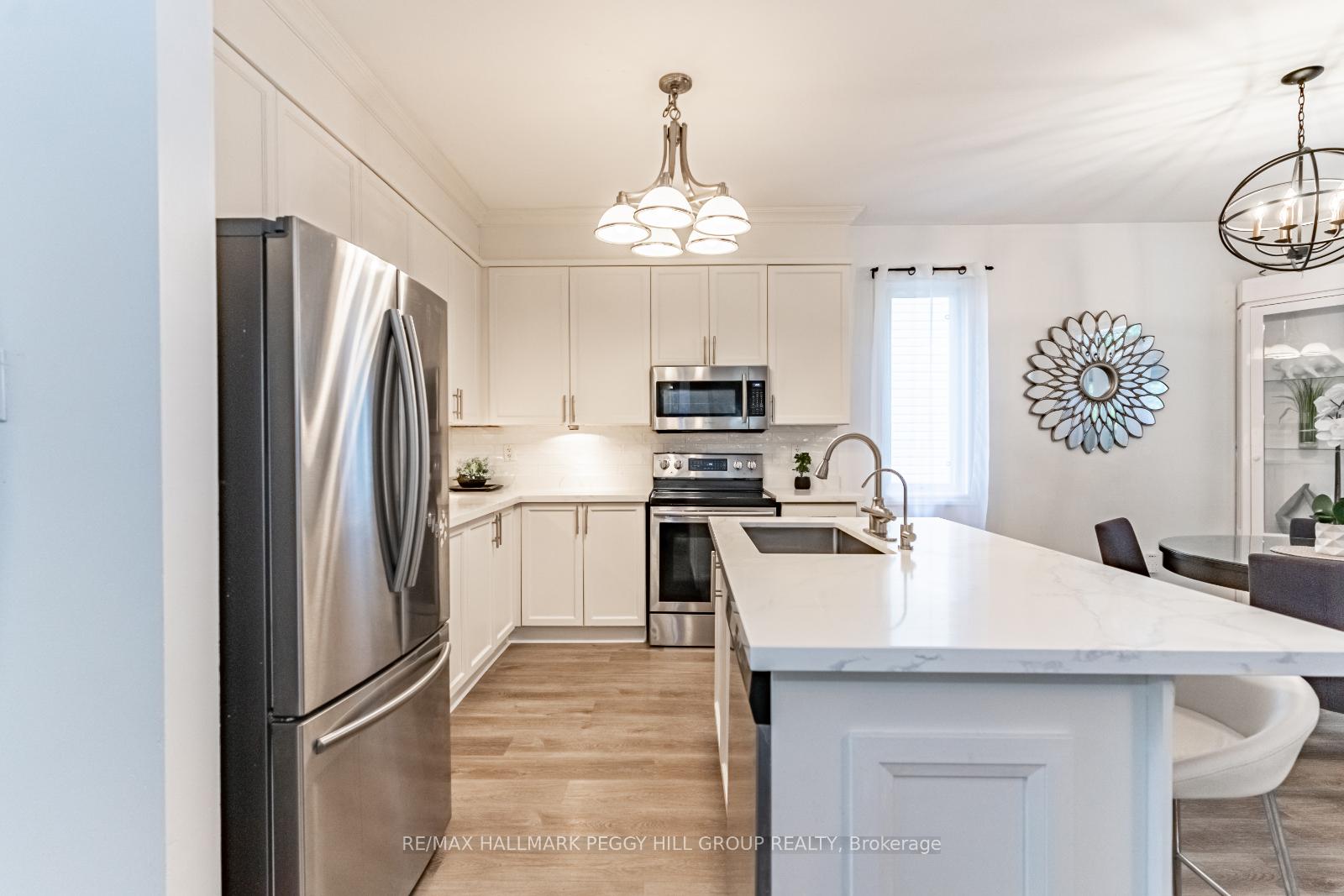 Photo 10 of 65 Oriole Crescent, Wasaga Beach — HOMEH