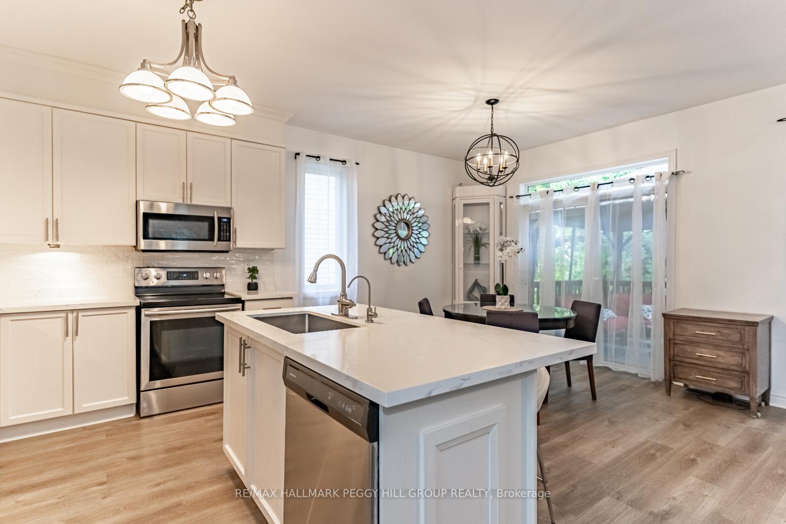 Photo 6 of 65 Oriole Crescent, Wasaga Beach — HOMEH