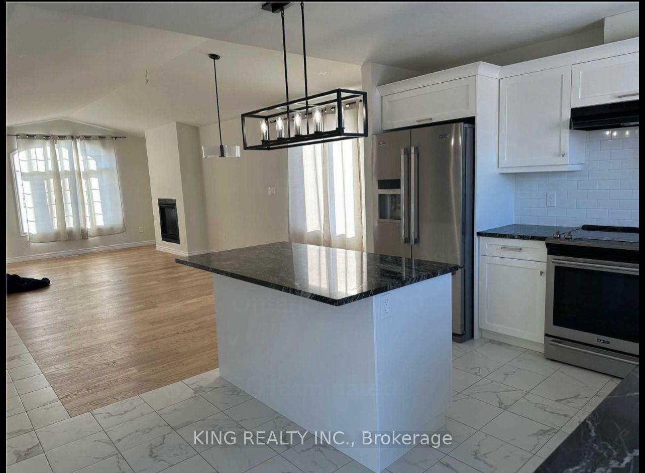 Photo 4 of 1133 Aspen Ridge Crescent, Lakeshore — HOMEH