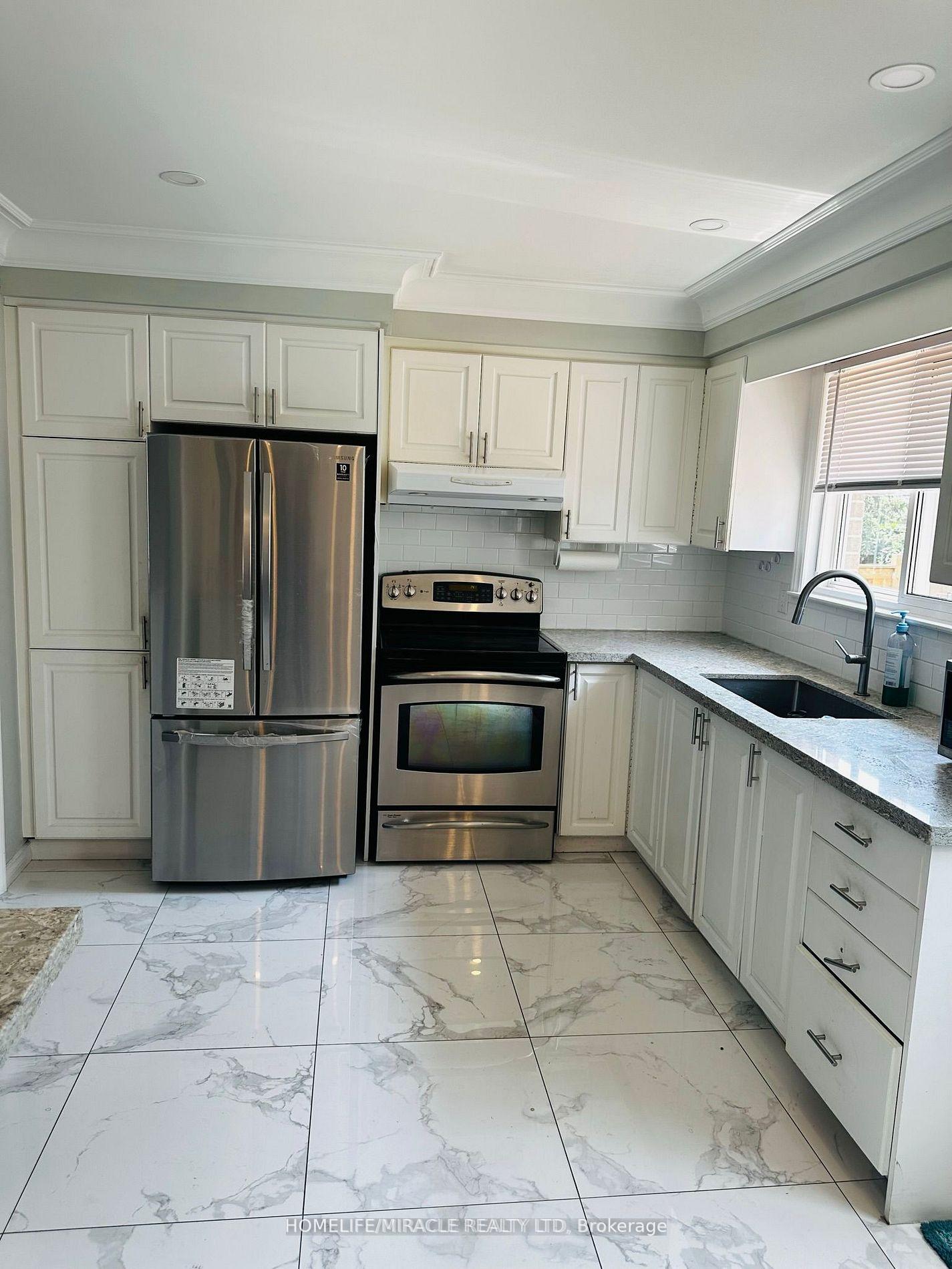Photo 9 of 213 Mcmurchy Avenue S, Brampton, Brampton South — HOMEH