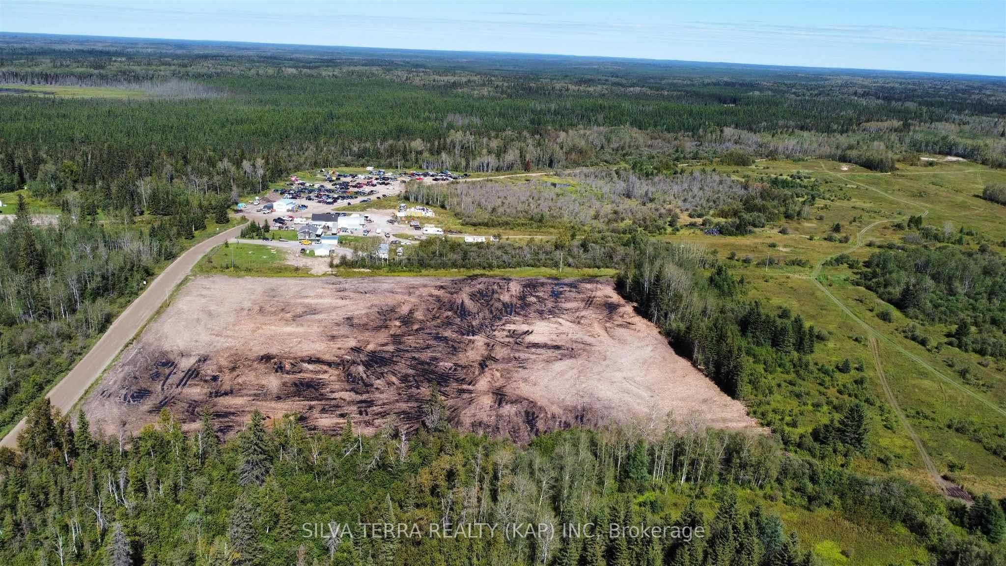 Photo 2 of 99 Ash Street, Kapuskasing — HOMEH