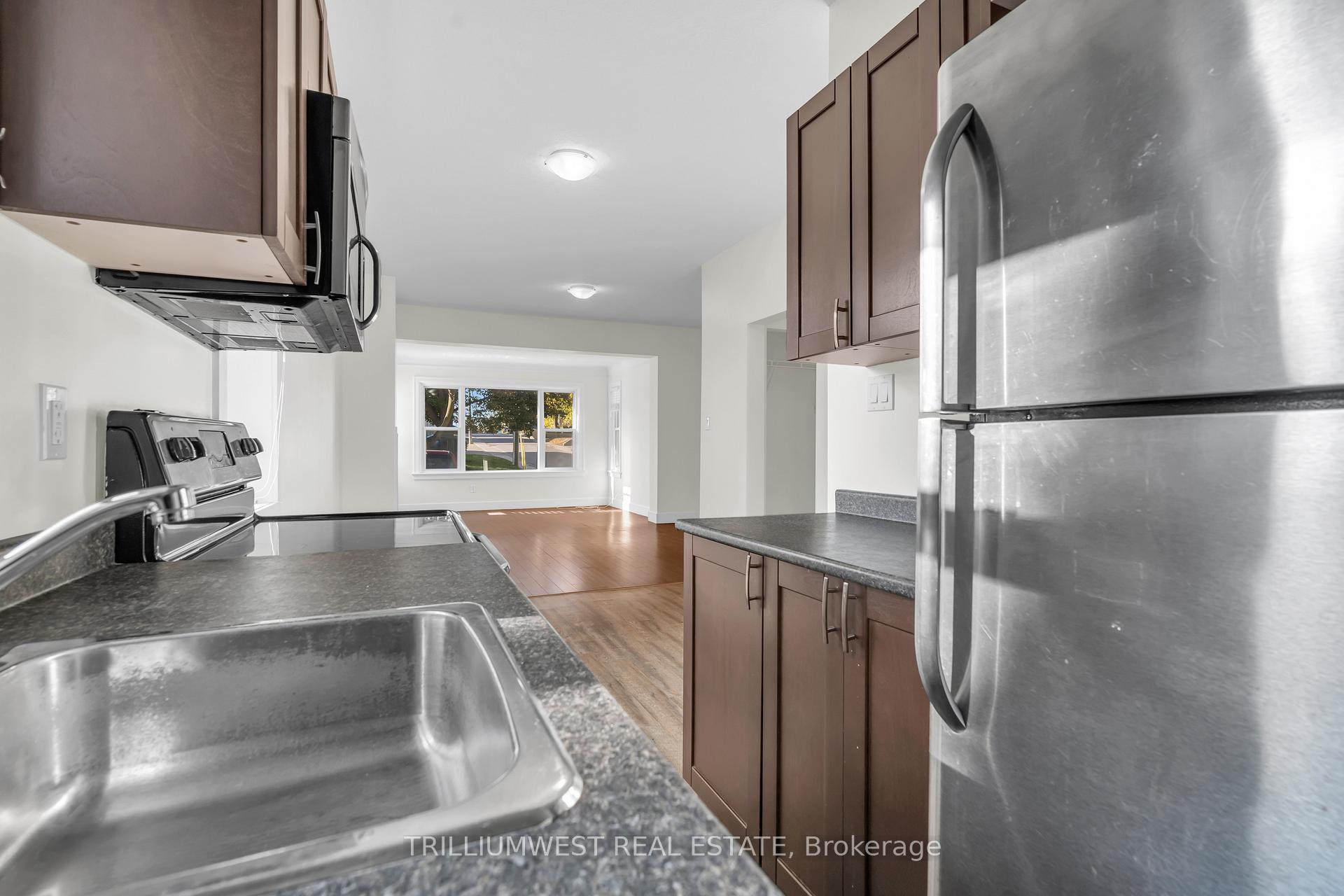 Photo 11 of Unit Unit B (Main), 98 Church Street, Kitchener — HOMEH