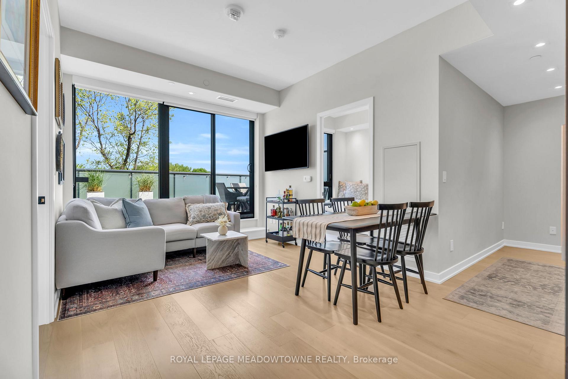 Photo 7 of Unit 703, 840 St Clair Avenue W, Toronto, Oakwood Village — HOMEH