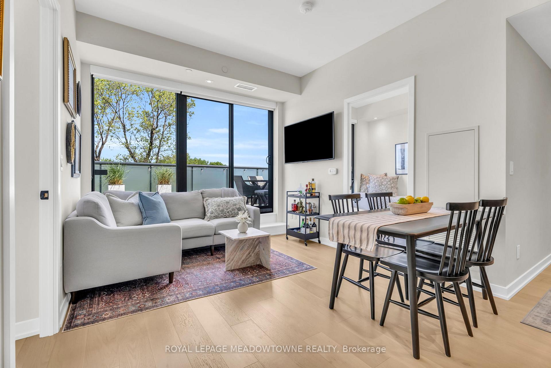 Photo 2 of Unit 703, 840 St Clair Avenue W, Toronto, Oakwood Village — HOMEH