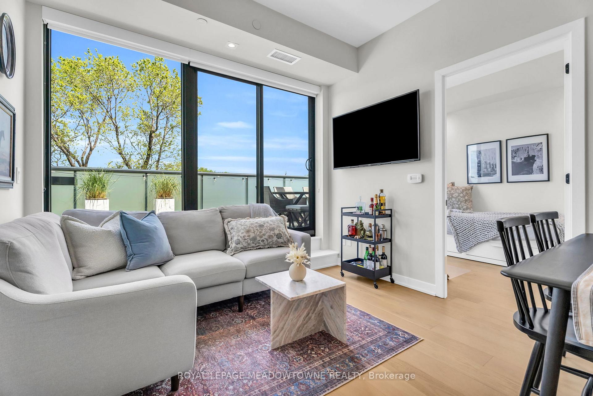 Photo 3 of Unit 703, 840 St Clair Avenue W, Toronto, Oakwood Village — HOMEH