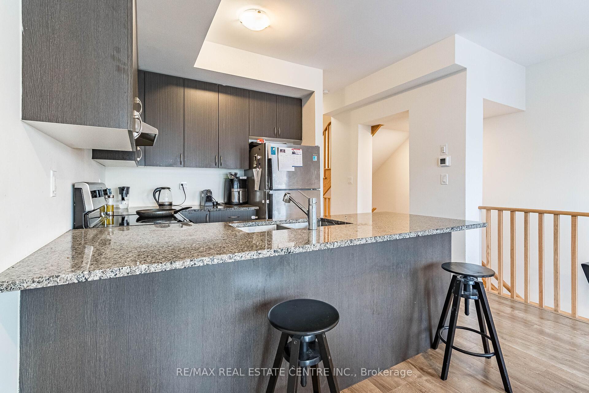Photo 7 of Unit 77, 277 Danzatore Path, Oshawa, Windfields — HOMEH