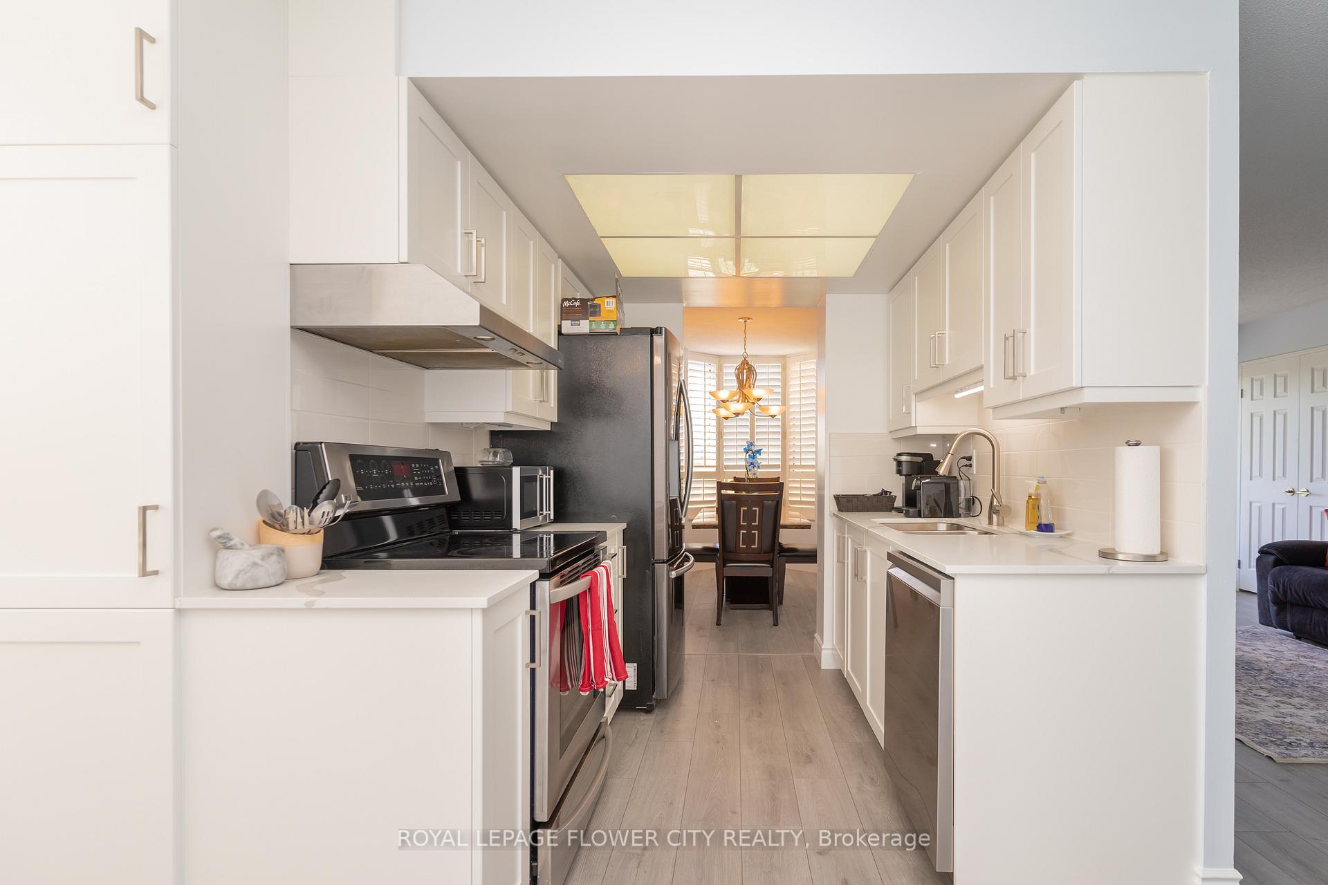 Photo 7 of Unit 304, 20 Cherrytree Drive, Brampton, Fletcher's Creek South — HOMEH
