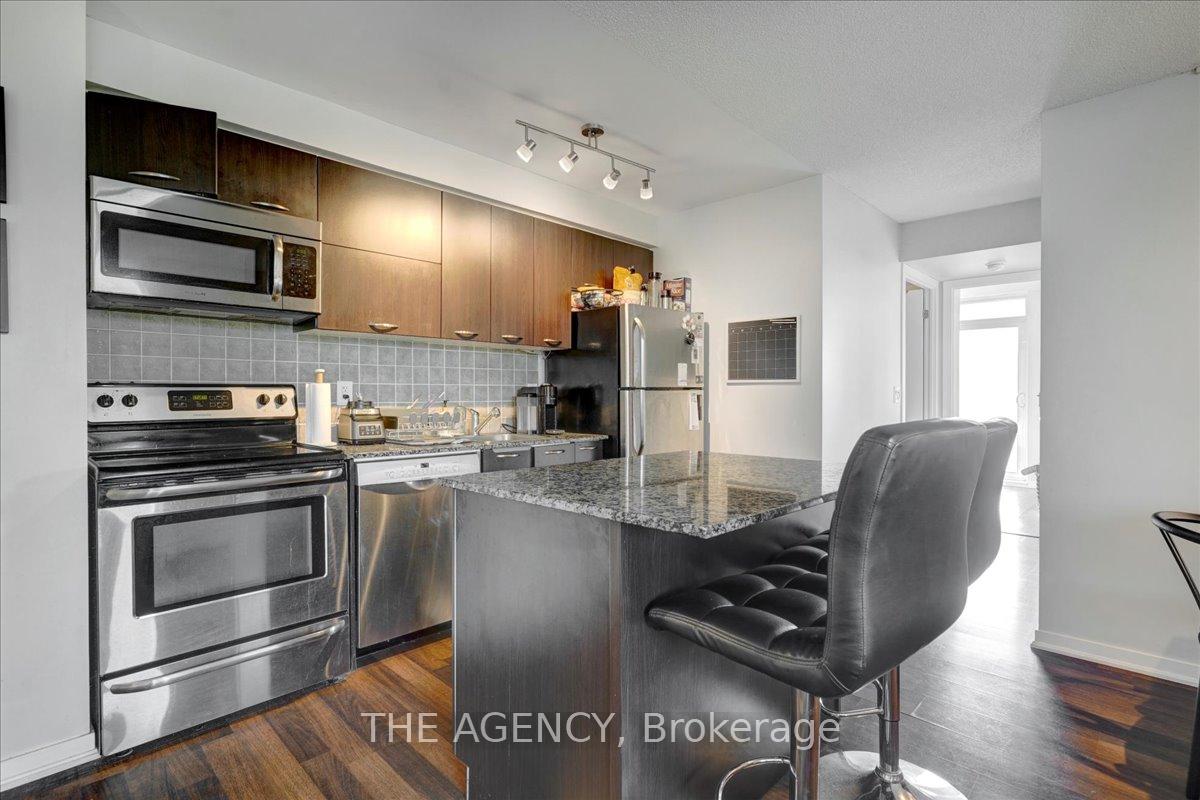 Photo 7 of Unit 407, 38 Joe Shuster Way, Toronto, Niagara — HOMEH