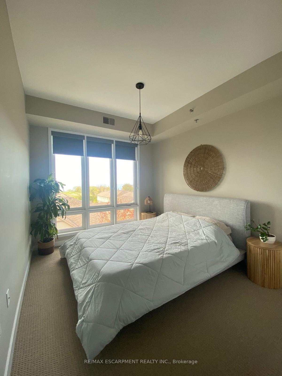 Photo 2 of Unit 404, 520 North Service Road, Grimsby, Grimsby Beach — HOMEH