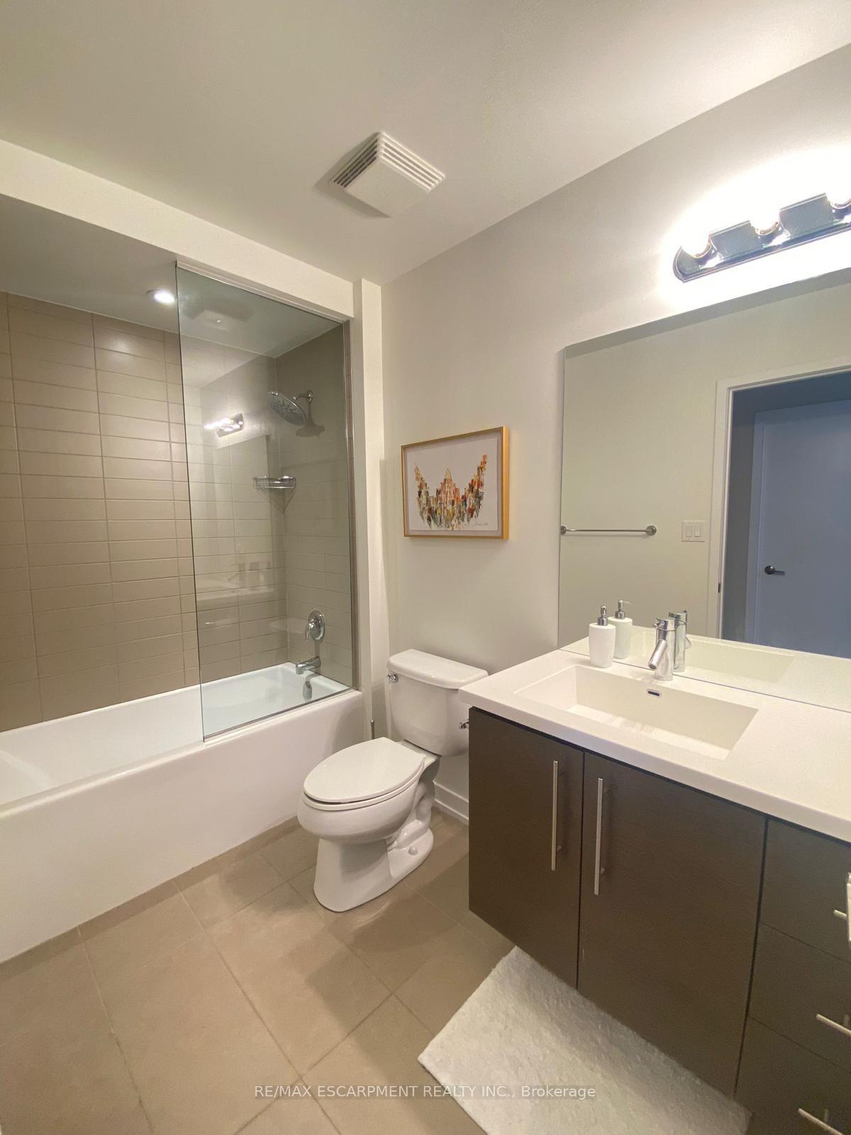 Photo 3 of Unit 404, 520 North Service Road, Grimsby, Grimsby Beach — HOMEH