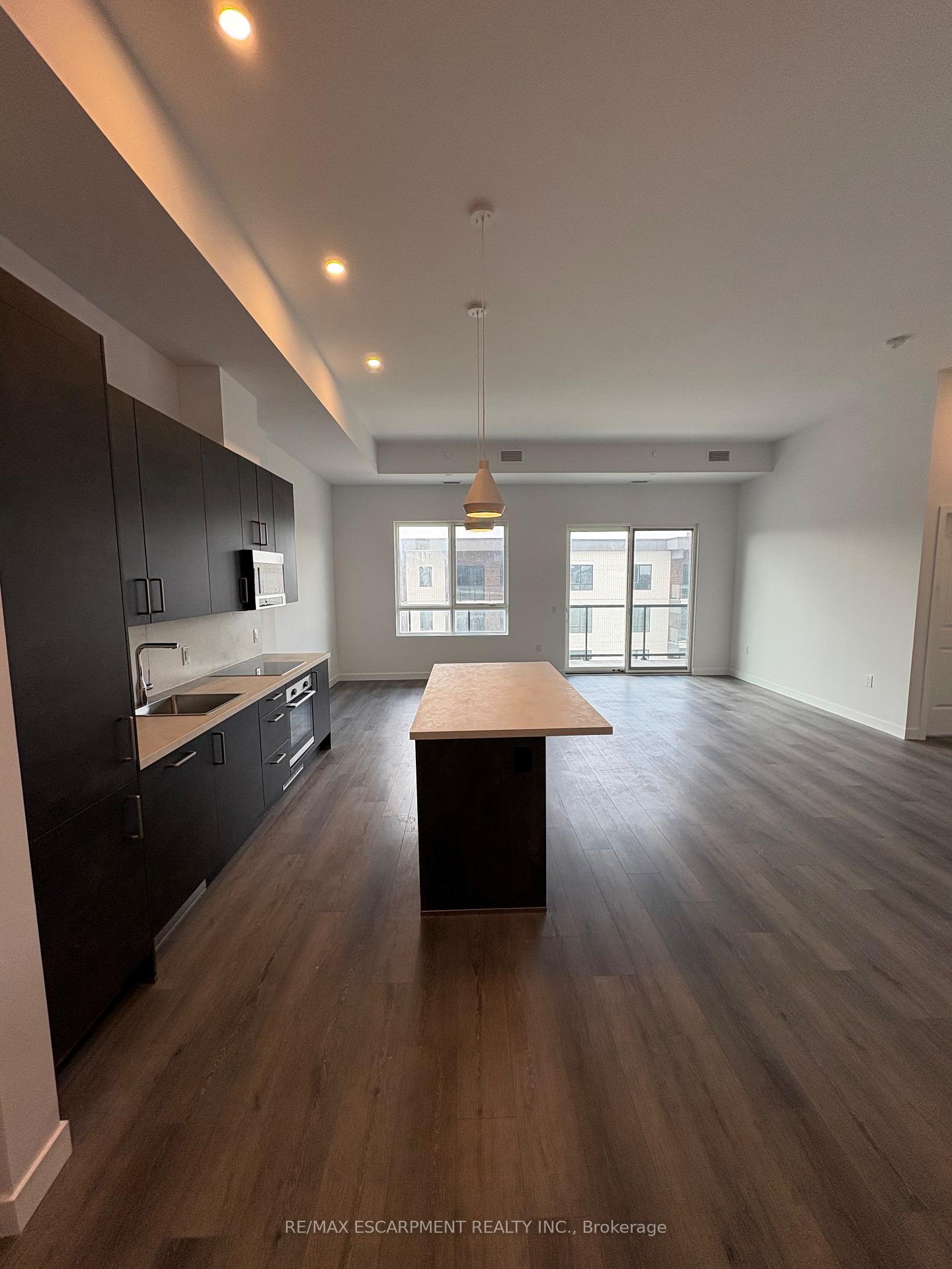 Photo 3 of Unit 417, 7549A Kalar Road, Niagara Falls, Brown — HOMEH