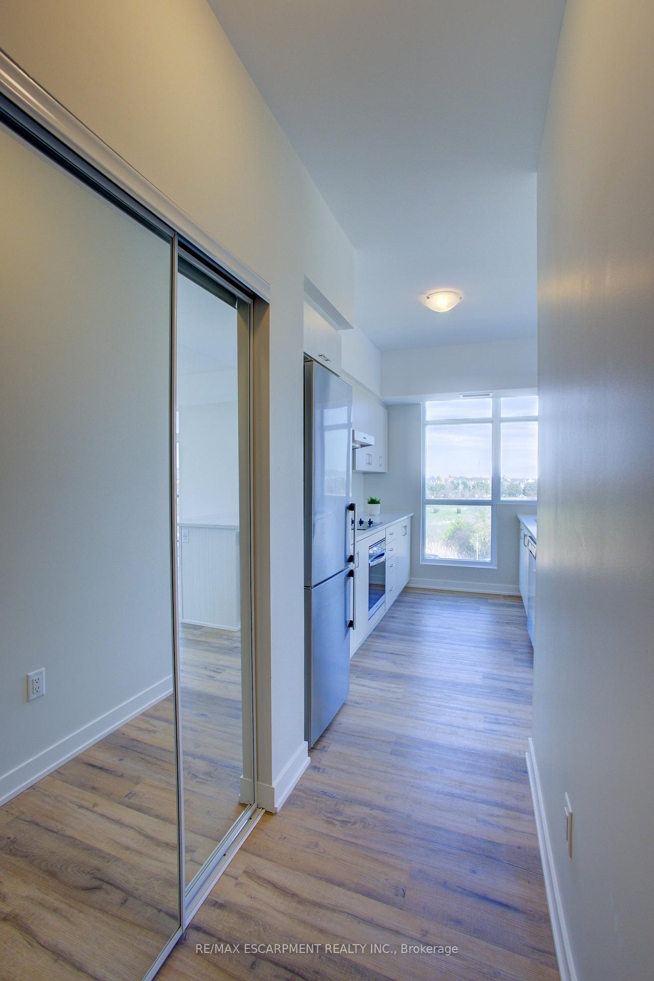 Photo 2 of Unit 421, 600 North Service Road, Hamilton, Stoney Creek — HOMEH