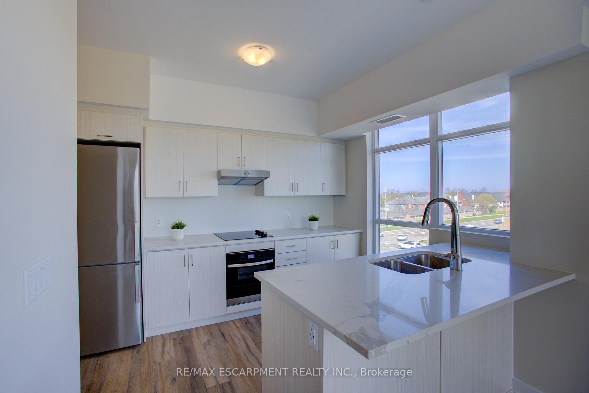 Photo 7 of Unit 421, 600 North Service Road, Hamilton, Stoney Creek — HOMEH