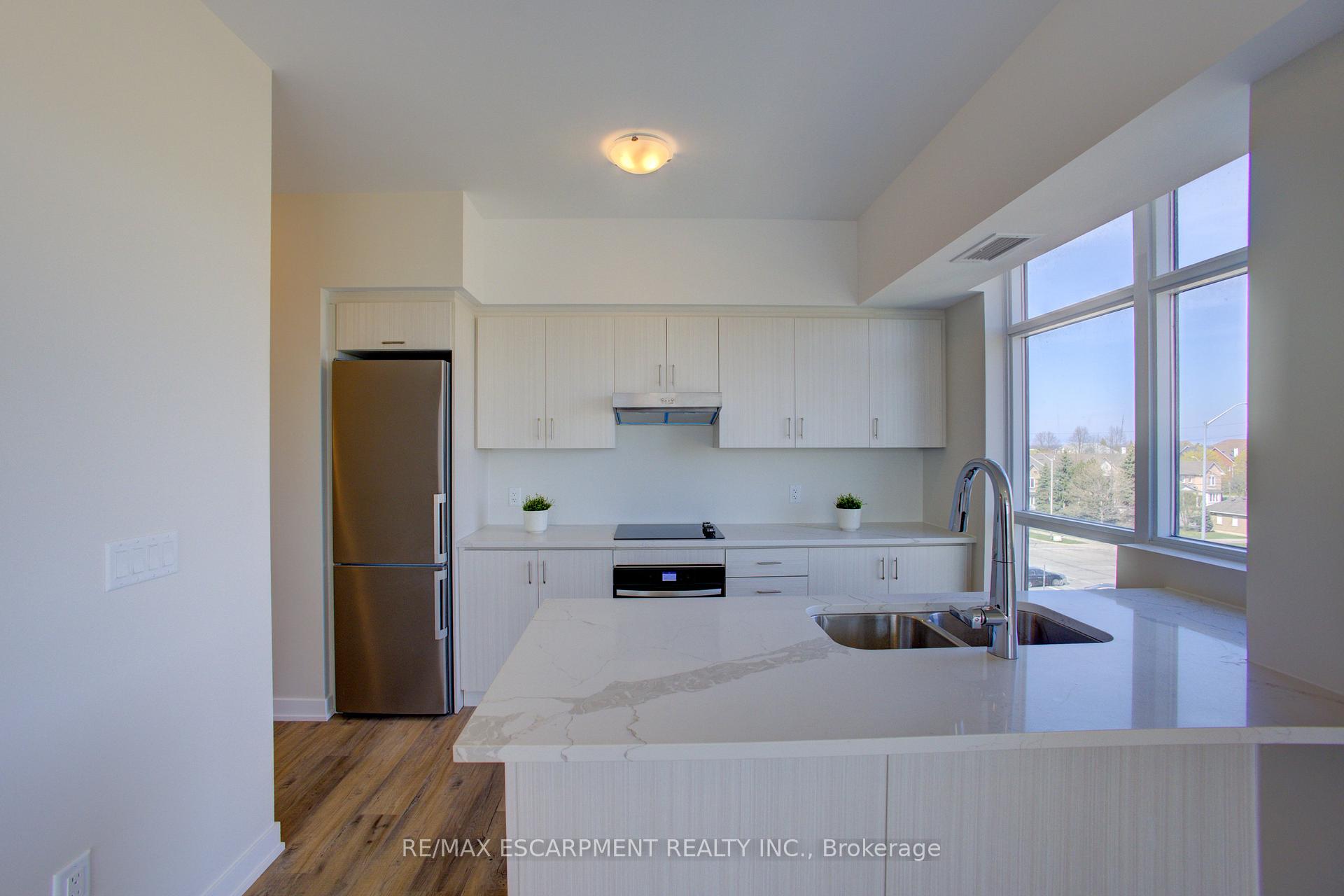 Photo 46 of Unit 421, 600 North Service Road, Hamilton, Stoney Creek — HOMEH